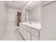 Fresh bathroom with a shower and tub combination, a large vanity, and neutral tones, creating a clean, serene atmosphere at 3739 Lake Carlton Rd, Loganville, GA 30052