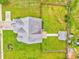Aerial view of a home and fenced backyard featuring a lawn and detached shed with easy access from the main house at 1016 E Bay Springs Dr, Villa Rica, GA 30180