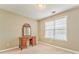Bedroom featuring an antique vanity with mirror and neutral walls and carpet at 1016 E Bay Springs Dr, Villa Rica, GA 30180