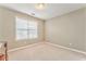 Bright bedroom with carpet, natural light and neutral walls at 1016 E Bay Springs Dr, Villa Rica, GA 30180