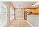 Eat in kitchen with stainless appliances, tile floors, bright windows, and ample counter space at 1016 E Bay Springs Dr, Villa Rica, GA 30180