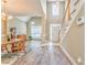 Open floor plan, wood floors, and an abundance of natural light create a welcoming atmosphere at 1016 E Bay Springs Dr, Villa Rica, GA 30180