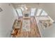 Bright open living room with wood flooring and a fireplace at 1016 E Bay Springs Dr, Villa Rica, GA 30180