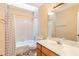 Neutral bathroom featuring a tub and shower combination with anchor-themed shower curtain at 1359 Cedar Park Pl, Stone Mountain, GA 30083