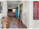 Inviting entryway with hardwood floors, stylish decor, and a glimpse into the spacious living area at 426 Samara Ct, Fairburn, GA 30213