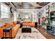 Bright living room with hardwood floors and a view into the kitchen at 569 Woods Nw Dr, Atlanta, GA 30318