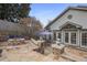 Backyard features a stone patio with a fire pit and outdoor seating, great for entertaining at 101 Terrace Dr, Atlanta, GA 30305