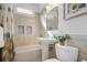 Bathroom with shower-tub combination, vanity sink, and mosaic tile accents at 101 Terrace Dr, Atlanta, GA 30305
