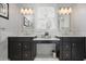Elegant bathroom with double vanities, marble countertops, and stylish fixtures at 101 Terrace Dr, Atlanta, GA 30305