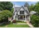 Charming two-story home with a landscaped front yard and inviting front porch at 101 Terrace Dr, Atlanta, GA 30305