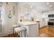Modern kitchen featuring white cabinets, quartz countertops, and stainless steel appliances at 101 Terrace Dr, Atlanta, GA 30305