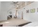 Spacious main bedroom with vaulted ceilings, a fireplace, and ample natural light at 101 Terrace Dr, Atlanta, GA 30305