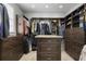 Large custom walk-in closet with built-in shelving, drawers, and center island at 101 Terrace Dr, Atlanta, GA 30305