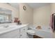 Bright bathroom with white vanity, soaking tub and lots of natural light at 2755 Greenbridge Dr, Norcross, GA 30071