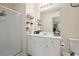 Clean bathroom featuring shower, neutral walls, and vanity with white sink and storage at 2755 Greenbridge Dr, Norcross, GA 30071