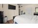 Bright bedroom with a bed, mounted tv, and neutral decor at 2755 Greenbridge Dr, Norcross, GA 30071