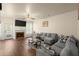 Inviting living room with hardwood floors, a fireplace, and a comfortable gray sofa at 2755 Greenbridge Dr, Norcross, GA 30071