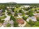 Serene neighborhood with lake, golf course, and mountain views, showcasing upscale homes and landscaped yards at 5917 Southland Dr, Stone Mountain, GA 30087
