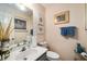 Bathroom featuring tiled floor, stylish decor, sink, and vanity at 5917 Southland Dr, Stone Mountain, GA 30087