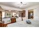 Open concept dining room view to living room with elegant fireplace at 5917 Southland Dr, Stone Mountain, GA 30087