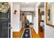 Elegant entryway with hardwood floors and views leading into the living room and other areas at 5917 Southland Dr, Stone Mountain, GA 30087