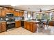 Spacious kitchen with granite countertops, stainless steel appliances, and breakfast nook at 5917 Southland Dr, Stone Mountain, GA 30087