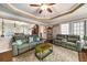 Spacious living room seamlessly flows into the dining area, perfect for entertaining and gatherings at 5917 Southland Dr, Stone Mountain, GA 30087