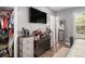 Well-lit bedroom with large closet, functional furniture, and neutral decor at 1150 Bonita Cir, Jonesboro, GA 30238