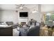 Inviting living room with modern decor, fireplace, and seamless access to dining area at 1150 Bonita Cir, Jonesboro, GA 30238