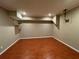 Finished basement with wood floors, neutral paint and recessed lighting at 1167 Drewsbury Ct, Smyrna, GA 30080