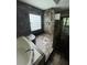 Bathroom showcasing a garden tub, glass block window, and shower at 1167 Drewsbury Ct, Smyrna, GA 30080