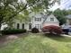 Charming home with a landscaped front yard and well-maintained lawn at 1167 Drewsbury Ct, Smyrna, GA 30080