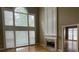 Bright, soaring living room with fireplace, built ins and huge windows at 1167 Drewsbury Ct, Smyrna, GA 30080