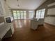 Spacious open-concept living room with fireplace, and built-in cabinets at 1167 Drewsbury Ct, Smyrna, GA 30080