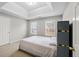 Bedroom featuring two windows and a unique bed headboard design at 1439 Alice Ave, Lithonia, GA 30058