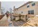 Backyard showing an outdoor kitchen with concrete countertops and tiled flooring at 1439 Alice Ave, Lithonia, GA 30058