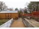 Shed in backyard with neutral paint at 1439 Alice Ave, Lithonia, GA 30058