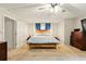 Spacious main bedroom with carpet and ceiling fan at 1825 Crescent Rdg, Cumming, GA 30041