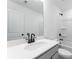 Bathroom featuring a vanity with black fixtures and a shower-tub combo at 6236 Kenbrook Dr, Tucker, GA 30084