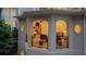 Inviting balcony featuring a fireplace and comfortable seating at 8109 Lawnview, Alpharetta, GA 30022