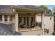 Charming upper-level balcony with seating and views of the surrounding landscape at 8109 Lawnview, Alpharetta, GA 30022