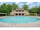 Gorgeous community pool with meticulously maintained deck and a relaxing water feature provides a serene retreat at 8109 Lawnview, Alpharetta, GA 30022