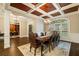 Formal dining room showcasing elegant details and seamless flow to other living areas at 8109 Lawnview, Alpharetta, GA 30022