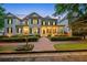 Elegant home featuring a brick walkway, manicured landscaping, and a welcoming covered porch with classic columns at 8109 Lawnview, Alpharetta, GA 30022