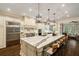 Bright, spacious kitchen featuring a large island with seating and stainless steel appliances at 8109 Lawnview, Alpharetta, GA 30022