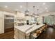 Bright, spacious kitchen with a large island, stainless steel appliances, and hardwood floors at 8109 Lawnview, Alpharetta, GA 30022