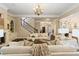 Open concept living room featuring a fireplace and staircase at 8109 Lawnview, Alpharetta, GA 30022