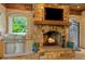 Outdoor grill and fireplace with stone surround at 8109 Lawnview, Alpharetta, GA 30022