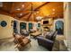 Inviting outdoor living space with fireplace, grill, and comfortable seating at 8109 Lawnview, Alpharetta, GA 30022