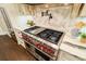 A gourmet kitchen with stainless steel appliances and marble countertops at 8109 Lawnview, Alpharetta, GA 30022